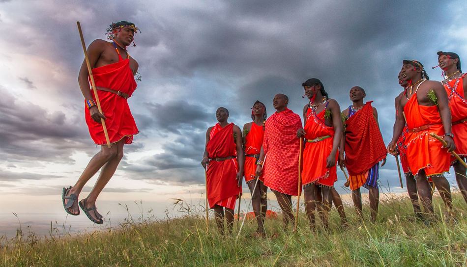 massai-warriors-jumping-on-a-tanzania-safari-with-andbeyond.jpg.950x0